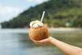 Coconut drink in hand Royalty Free Stock Photo