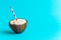 Coconut drink isolated on blue background abstract concept.