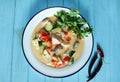 Coconut fish chowder with tuna, salmon and fresh vegetables