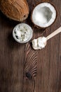Coconut food with paste and wooden spoon on table background top view mockup