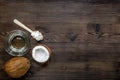 Coconut food with water and wooden spoon on table background top view mockup