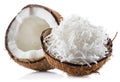 Coconut fruit and shredded coconut flakes in the piece of shell isolated on white background Royalty Free Stock Photo