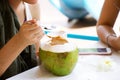 Woman is eating coconut