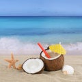 Coconut fruits cocktail drink in summer on the beach Royalty Free Stock Photo