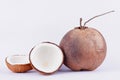 Coconut half clipping path for coconut milk and brown ripe coconut on white background healthy fruit food