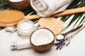 Coconut half, cosmetic cream, massage towel
