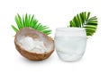 Coconut juice in glass cup with green leaves pattern isolated on white background Royalty Free Stock Photo