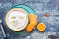 Coconut lime sorbet and orange popsicles with fresh fruits Royalty Free Stock Photo