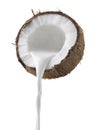 Coconut milk pouring side view isolated on white background