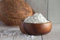 Coconut milk powder in wooden bowl Royalty Free Stock Photo