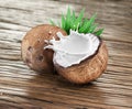 Coconut with milk splash inside. Royalty Free Stock Photo