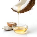 Coconut Oil Falling from Coconut Slice Isolated on White Background Royalty Free Stock Photo