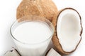 Coconut oil and fresh coconuts isolated on white background Royalty Free Stock Photo