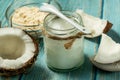 Coconut oil and protein with fresh coconuts Royalty Free Stock Photo