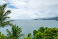 Coconut palm trees frame against blue sky and tropical sea background beautiful tropical sea summer sunny day background Royalty Free Stock Photo