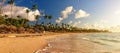 Coconut palm trees on white sandy beach against colorful sunset in Punta Cana, Dominican Republic Royalty Free Stock Photo