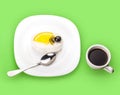 Coconut piece of cake and coffee cup