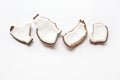 Coconut pieces on white background. Royalty Free Stock Photo