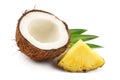 Coconut with pineapple and green leaves isolated on white background Royalty Free Stock Photo