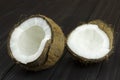 Coconut pulp fresh tropical brown white organic coconut milk on wooden black background