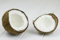 Coconut pulp fresh tropical brown white organic coconut milk on wooden white background