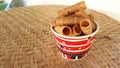 Coconut rolls in paper cups filled