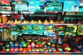 Coconut shell bowls on the wooden shelf. Souvenir coconut bowls selling on the market