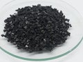 Coconut shell charcoal activated carbon pellets for water filtration Royalty Free Stock Photo