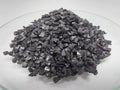 Coconut shell charcoal activated carbon pellets for water filtration Royalty Free Stock Photo