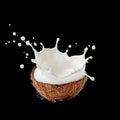 Coconut Shell Filled With Splash of Milk on White Background Creating Dynamic Visual Effect Royalty Free Stock Photo