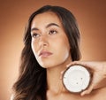 Coconut skincare beauty, woman and studio for health, wellness and natural radiant glow by backdrop. Model, face and
