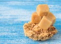 Coconut sugar , Cube sugar , Rice Crackers on Blue background. Royalty Free Stock Photo