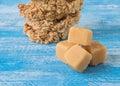 Coconut sugar , Cube sugar , Rice Crackers on Blue background. Royalty Free Stock Photo