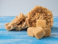 Coconut sugar , Cube sugar , Rice Crackers on Blue background. Royalty Free Stock Photo