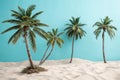 Coconut trees on a beach with sand and blue background Royalty Free Stock Photo