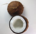 Coconut two cut pieces with shell isolated Royalty Free Stock Photo