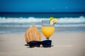 Coconut, cocktail and glasses by the ocean