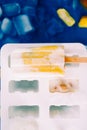 Coconut yogurt and mango popsicles