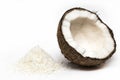 Coconuts with coconuts flakes isolated on the white background Royalty Free Stock Photo