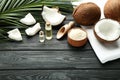 Coconuts with oil in bottles Royalty Free Stock Photo