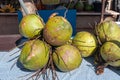 Coconuts at a street market in Phuket.