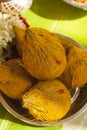 Coconuts with turmeric on upanayanam ceremony function.
