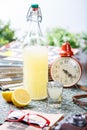 Coctail in glassy bottle and glass