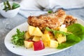 Crusted cod with peach and pineapple salsa Royalty Free Stock Photo