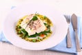 Cod fillet with green beans, peas, parsley, olive oil Royalty Free Stock Photo