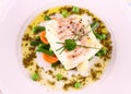 Cod Fillet with green beans, peas, parsley Royalty Free Stock Photo