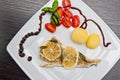 Cod fish dish with lemons and tomatoes