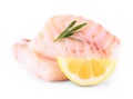 Cod fish fillet with lemon, rosemary on white