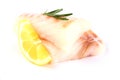 Cod fish fillet with lemon, rosemary on white Royalty Free Stock Photo
