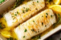 Cod fish fillets with lemon and thyme. Selective focus Royalty Free Stock Photo
